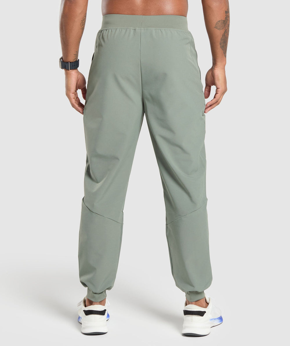 Ease Woven Joggers - Unit Green